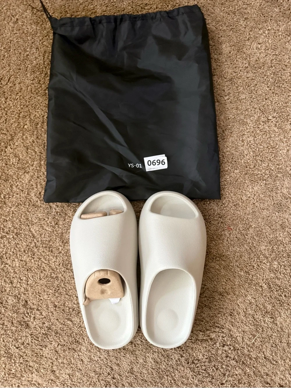 Yeezy Slide Sandals in Bone/Light Grey